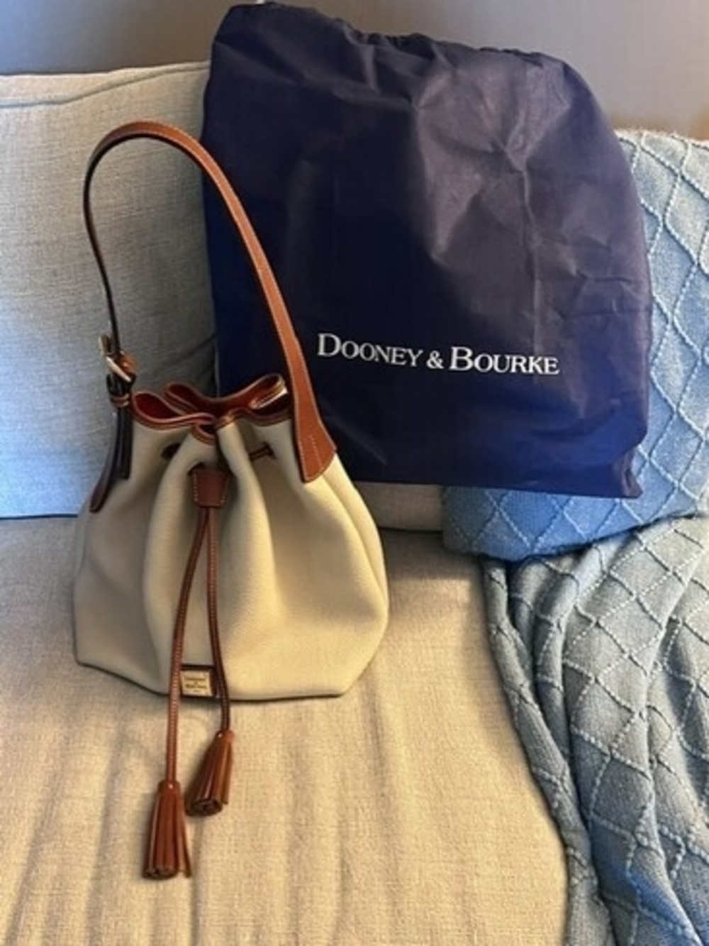 Dooney & Bourke Cream Canvas Drawstring Bucket Bag with British Tan Trim